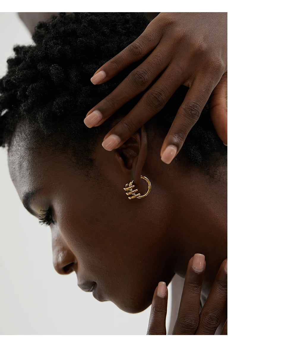 Geometric earrings in gold-plated stainless steel.