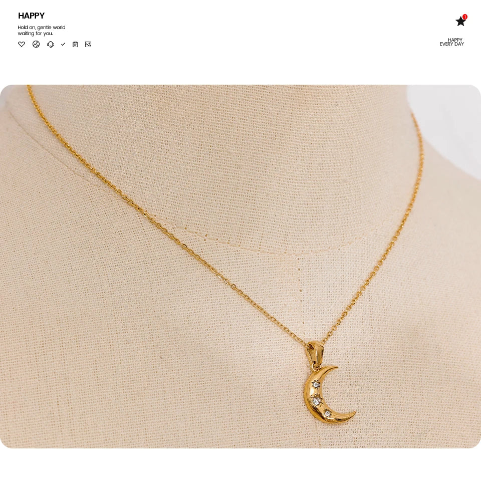 Cubic zirconia moon necklace in gold-plated stainless steel with cubic zirconia.