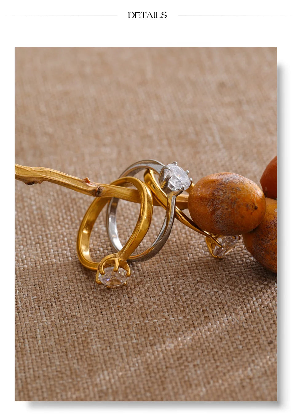 Cubic zirconia geometric ring in 18K gold-plated stainless steel with cubic zirconia.