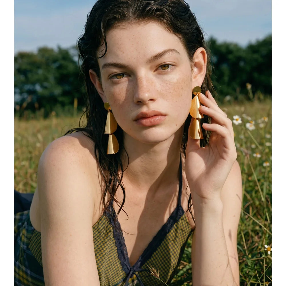 Geometric earrings in stainless steel.