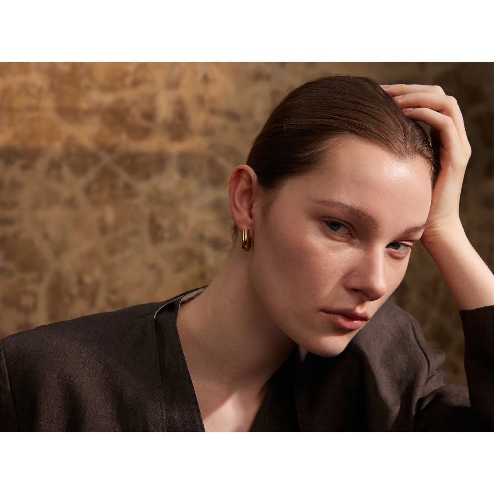 Geometric earrings in gold-plated 316L stainless steel.