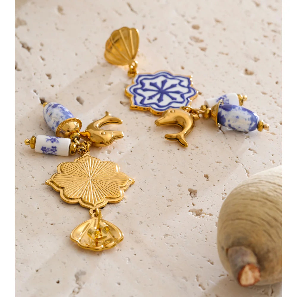 Blue shell enamel earrings in gold-plated stainless steel with shell and enamel.