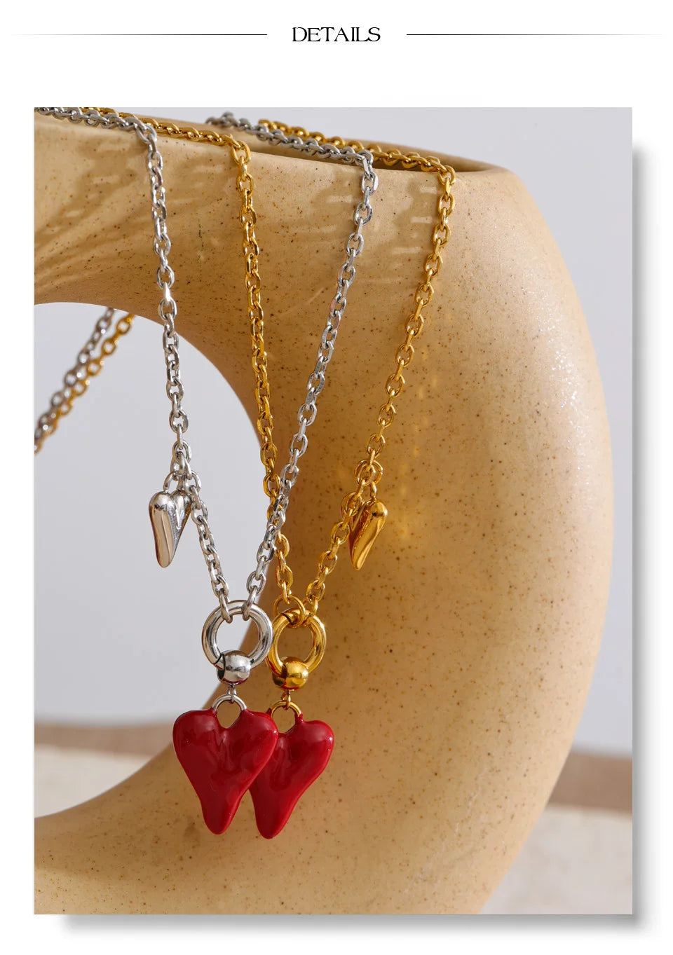 Enamel heart necklace in gold-plated stainless steel with enamel.