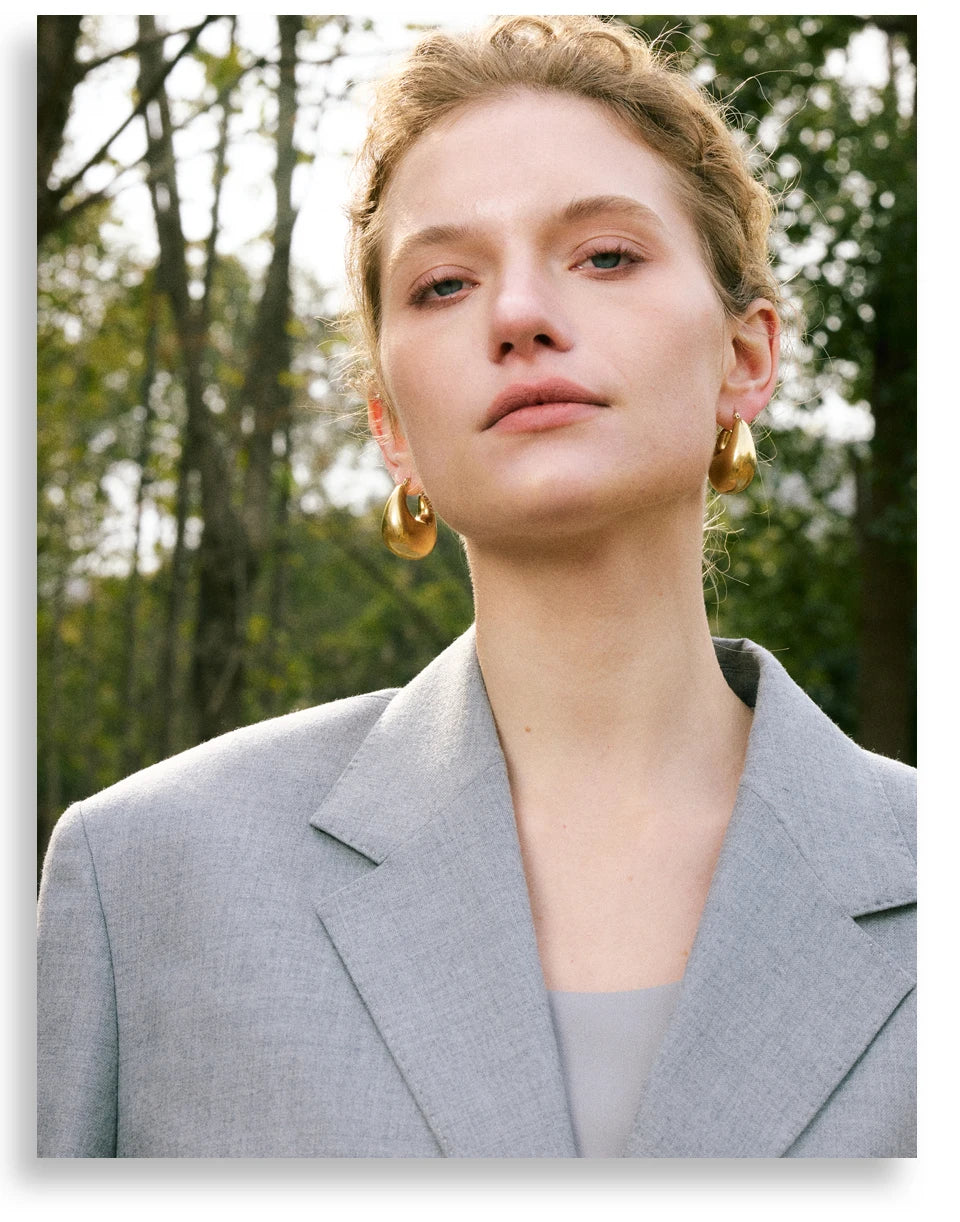 Geometric earrings in gold-plated stainless steel.