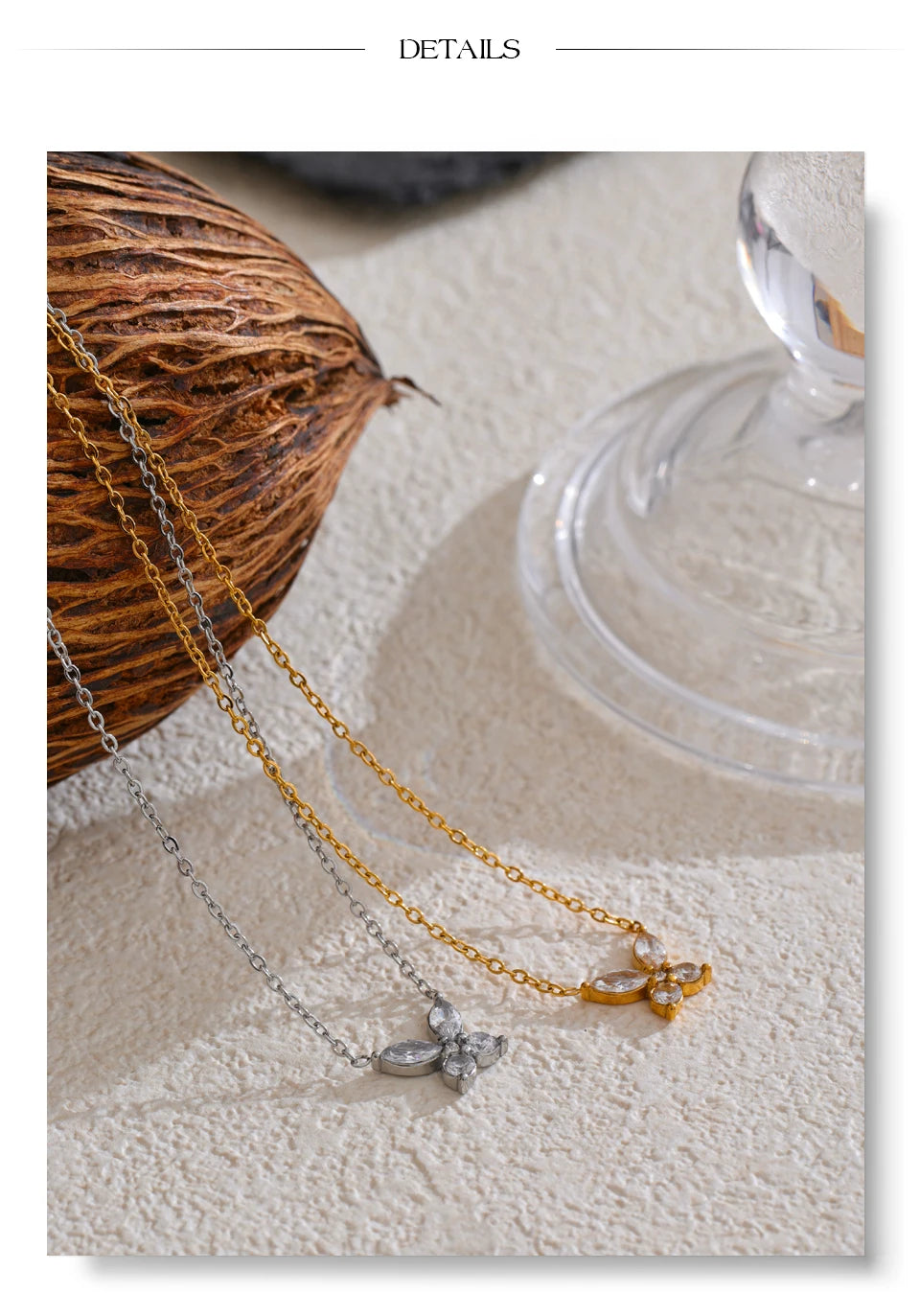 Cubic zirconia butterfly necklace in gold-plated stainless steel with cubic zirconia.