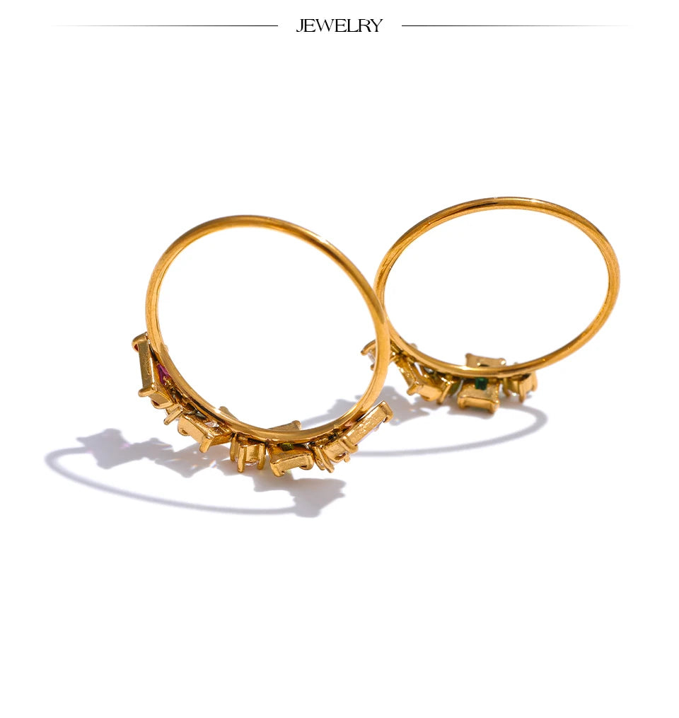 Cubic zirconia multi-color geometric ring in 18K gold-plated stainless steel with cubic zirconia.