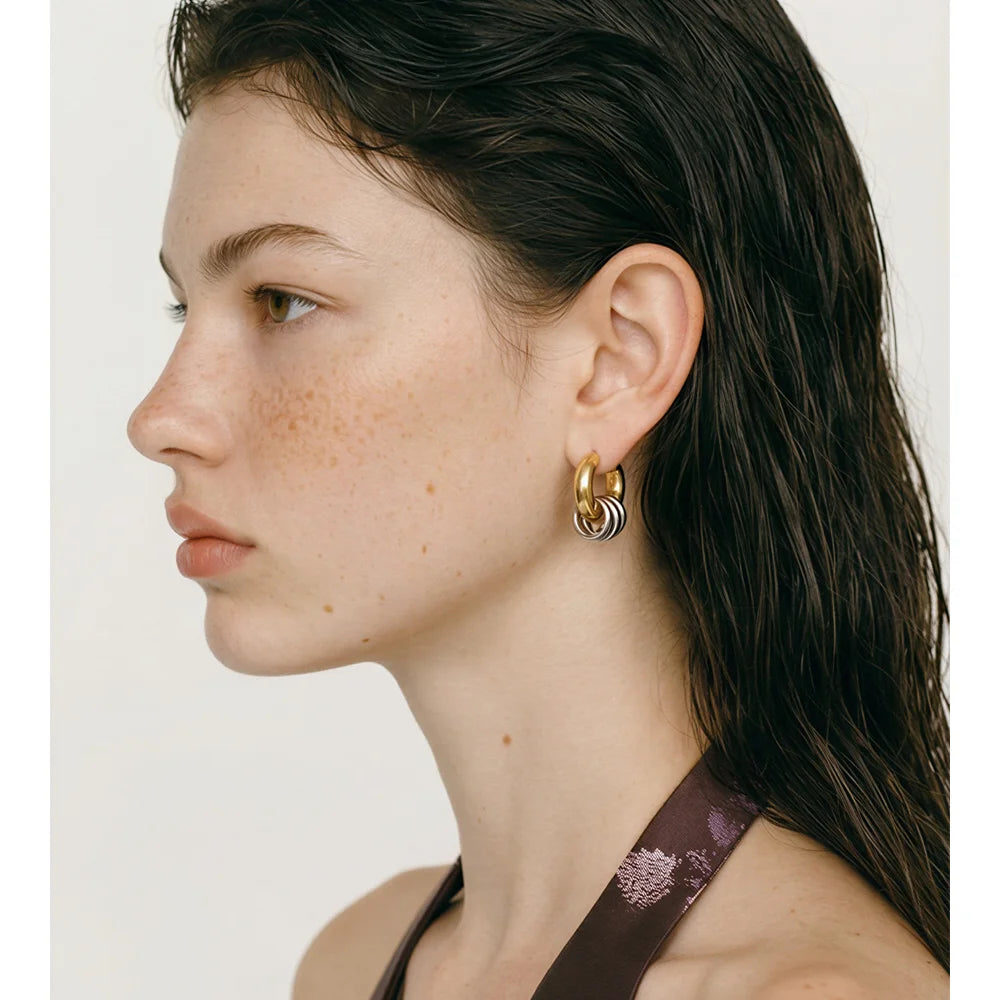 Geometric layered earrings in gold-plated stainless steel.