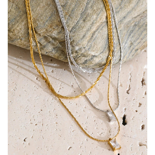 Cubic zirconia geometric chain necklace in gold-plated stainless steel with cubic zirconia.