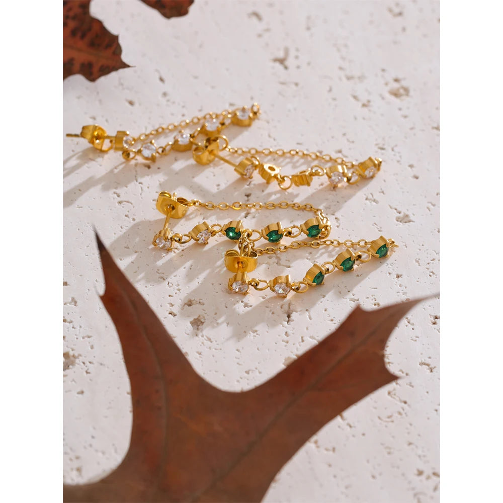 White cubic zirconia geometric earrings in gold-plated stainless steel with cubic zirconia.