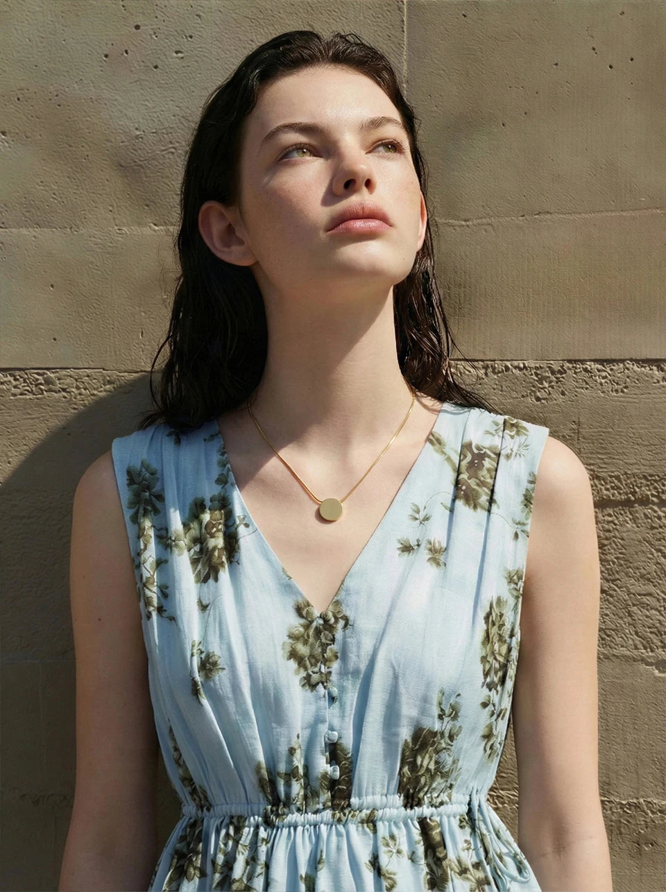 Coin geometric necklace in gold-plated stainless steel.