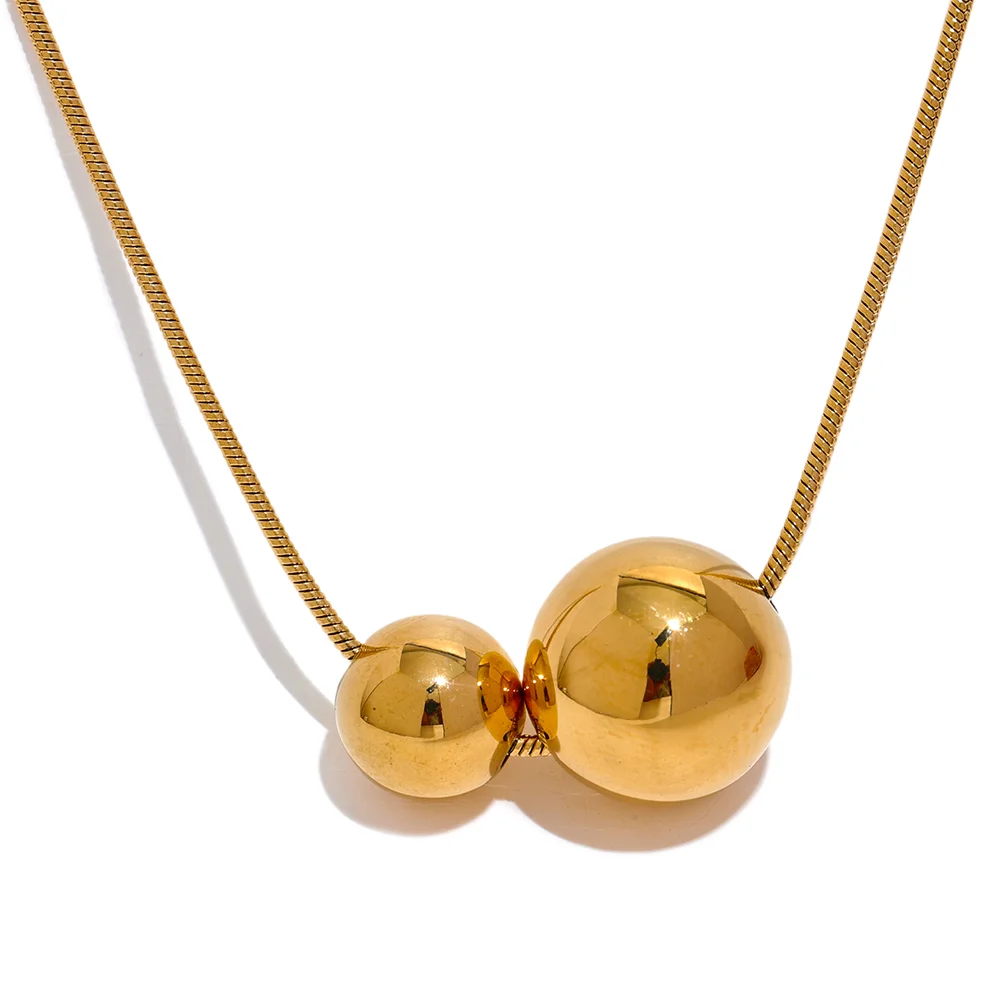 Beaded geometric necklace in gold-plated stainless steel.