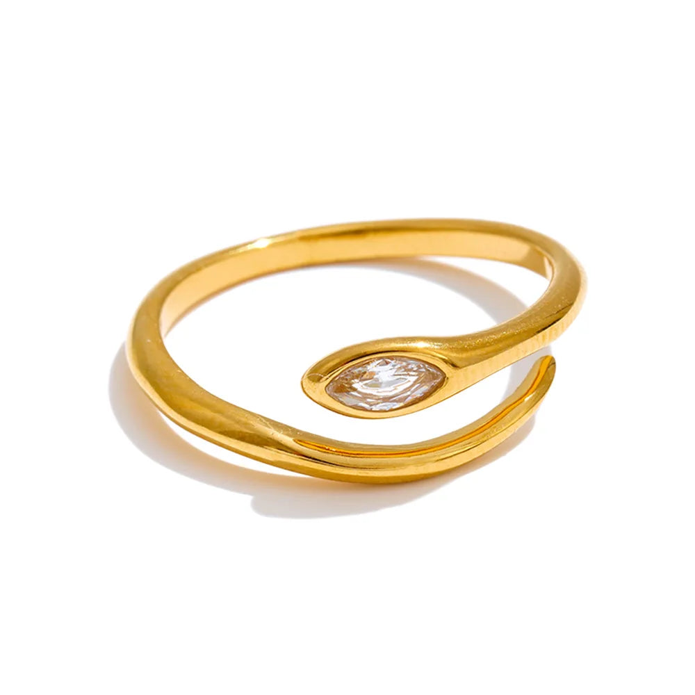 Cubic zirconia snake geometric ring in 18K gold-plated stainless steel with cubic zirconia.