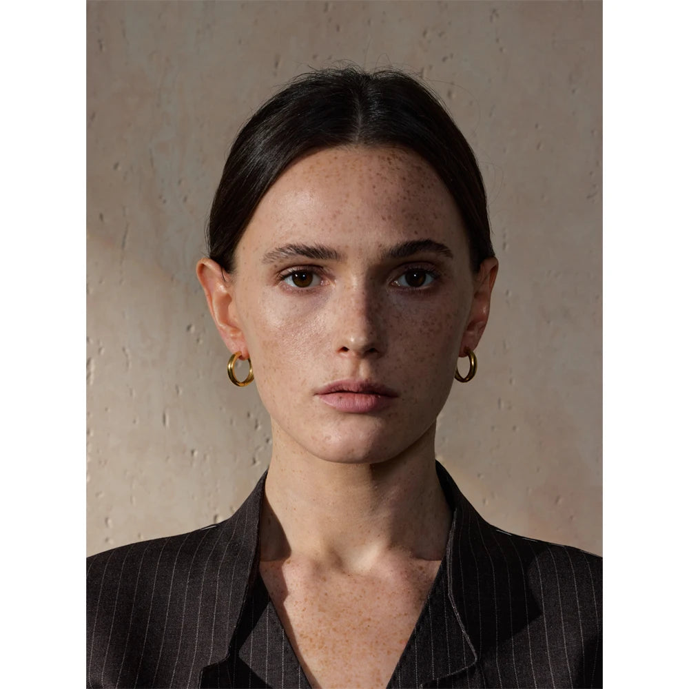Geometric earrings in gold-plated stainless steel.