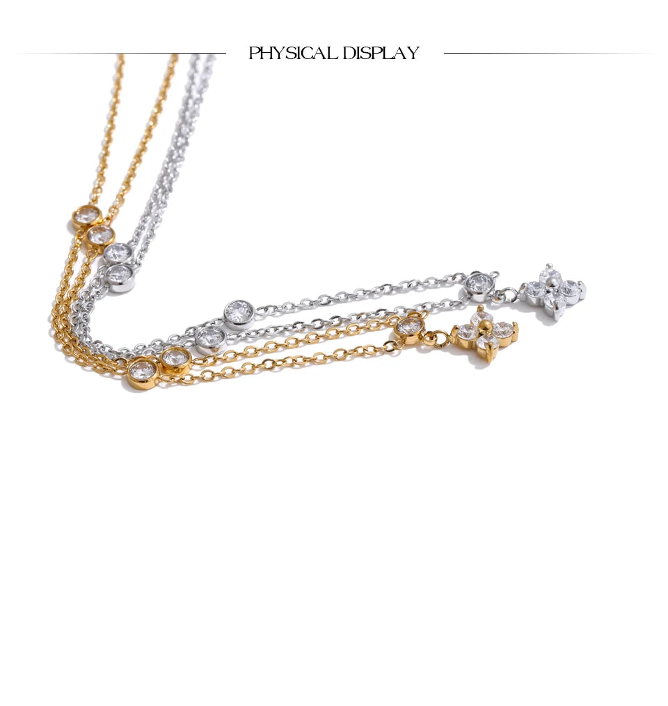 Cubic zirconia flower necklace in gold-plated stainless steel with cubic zirconia.