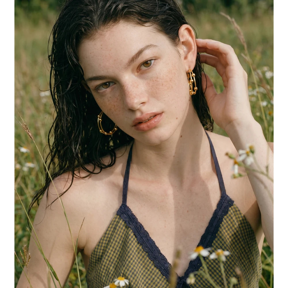 Geometric earrings in gold-plated stainless steel.