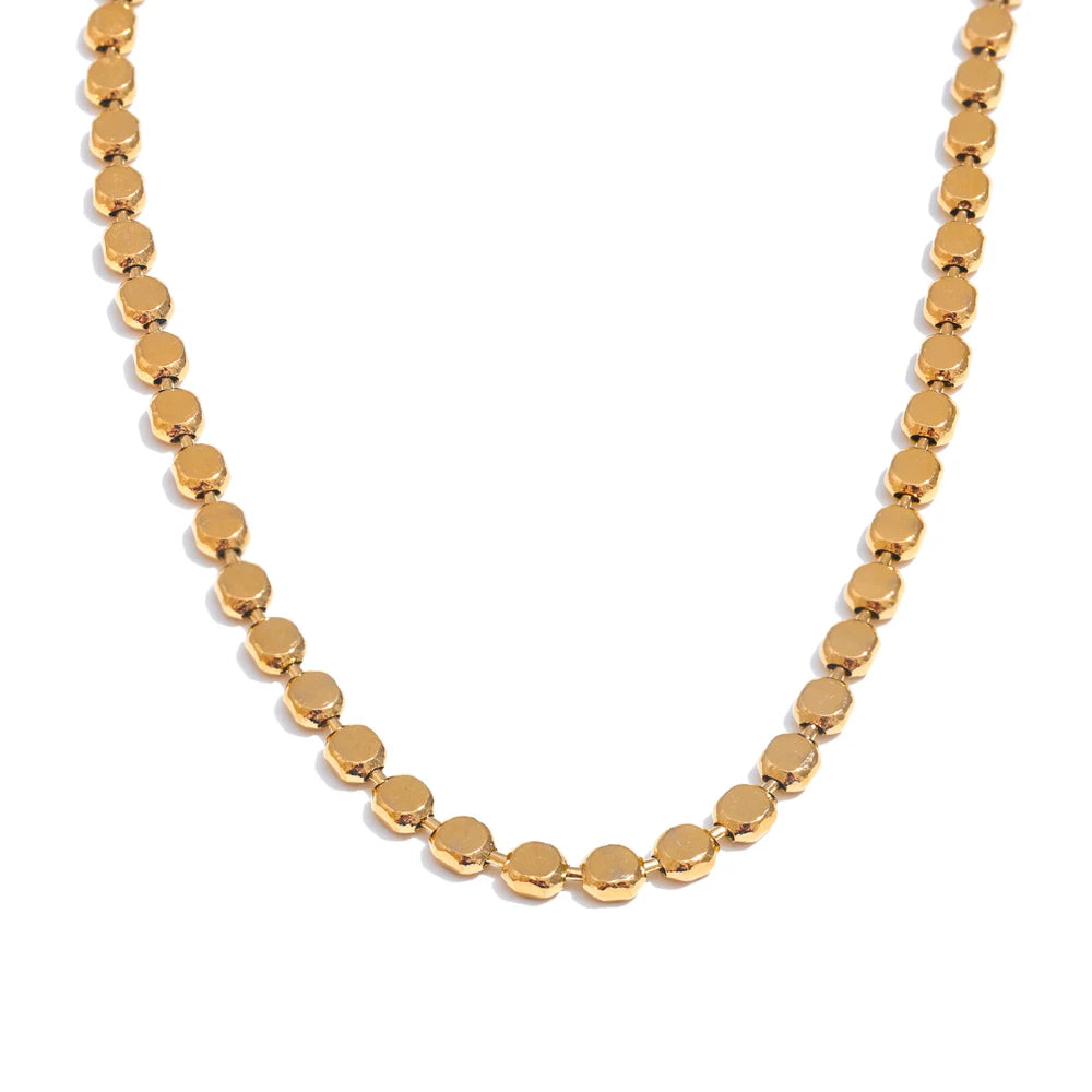 Gold-plated stainless steel necklace with circular beads.