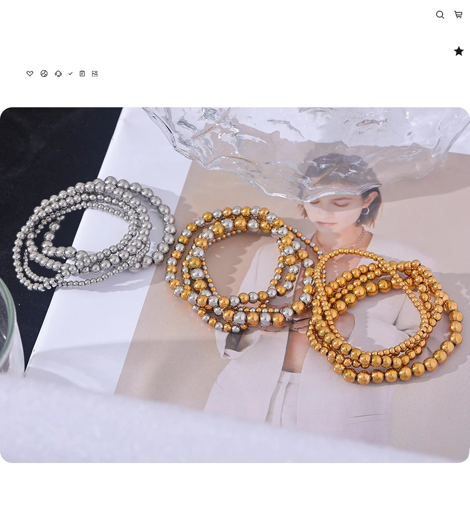 Beaded geometric bracelet in gold-plated stainless steel.