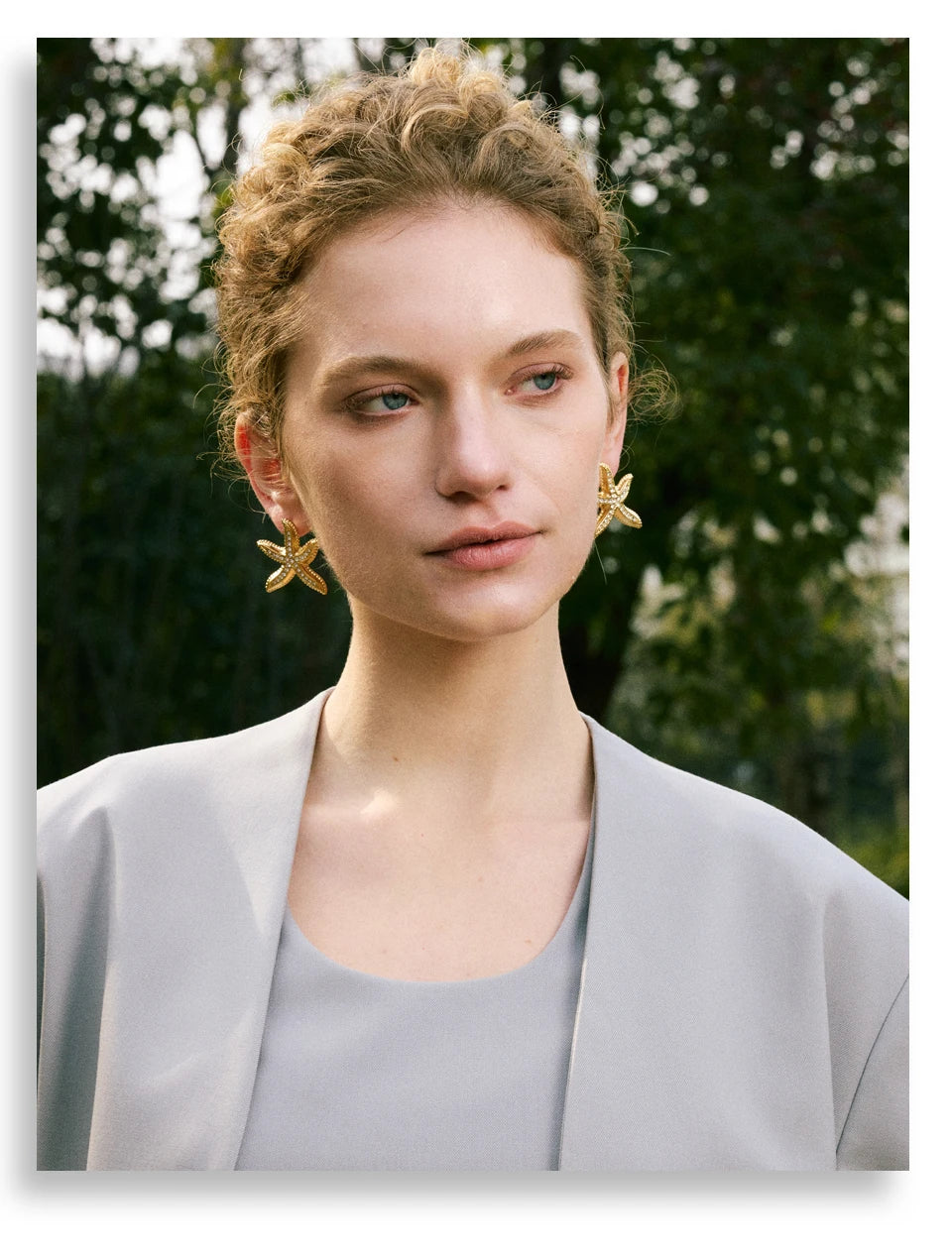 Pearl star earrings in gold-plated stainless steel with pearl.