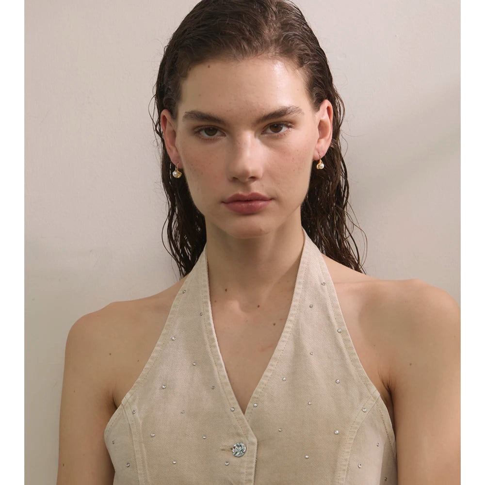 Pearl earrings in gold-plated stainless steel with pearl.
