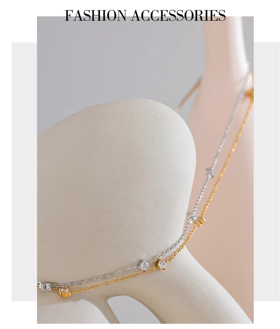 Cubic zirconia geometric necklace in gold-plated stainless steel with cubic zirconia.