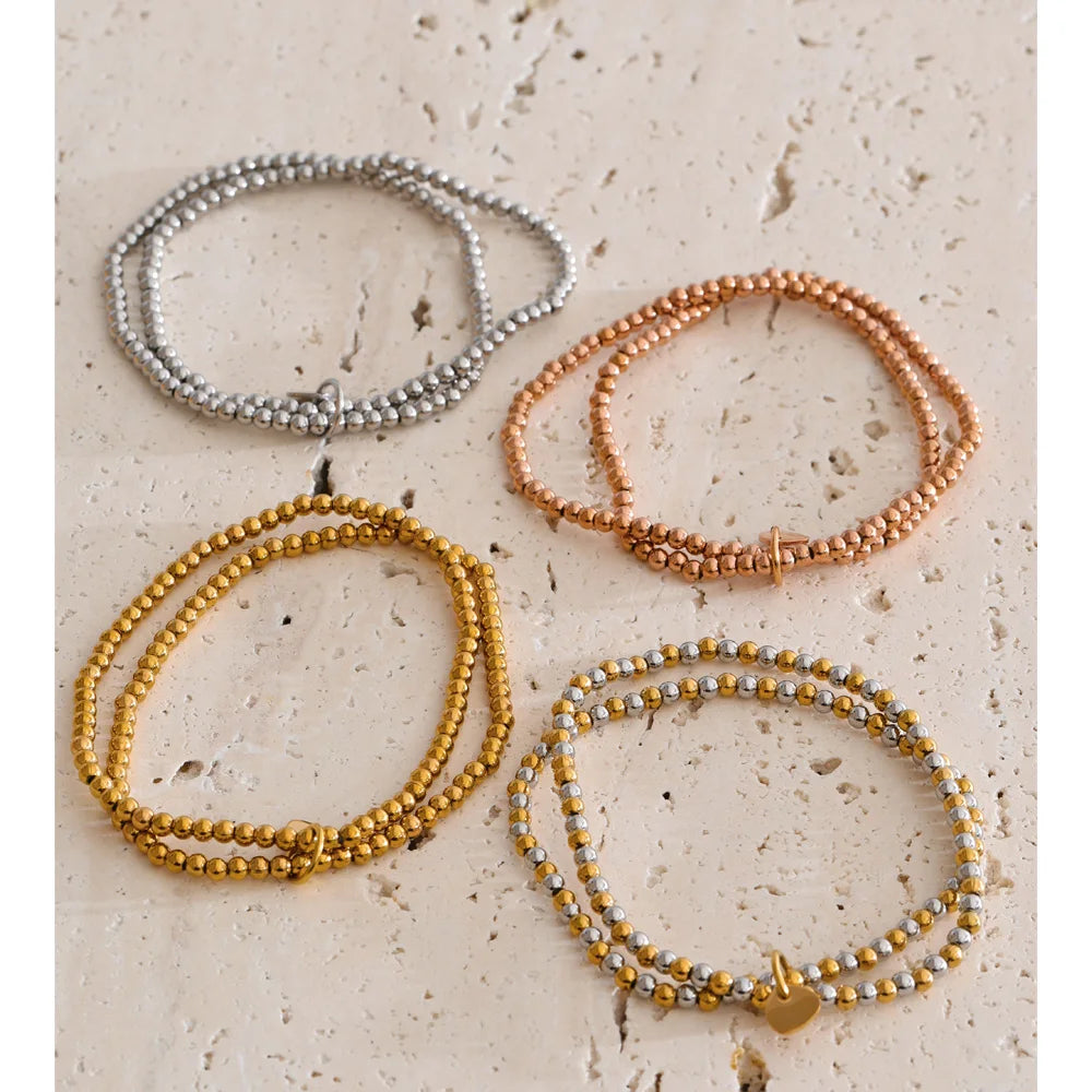 Beaded geometric bracelet in gold-plated stainless steel.
