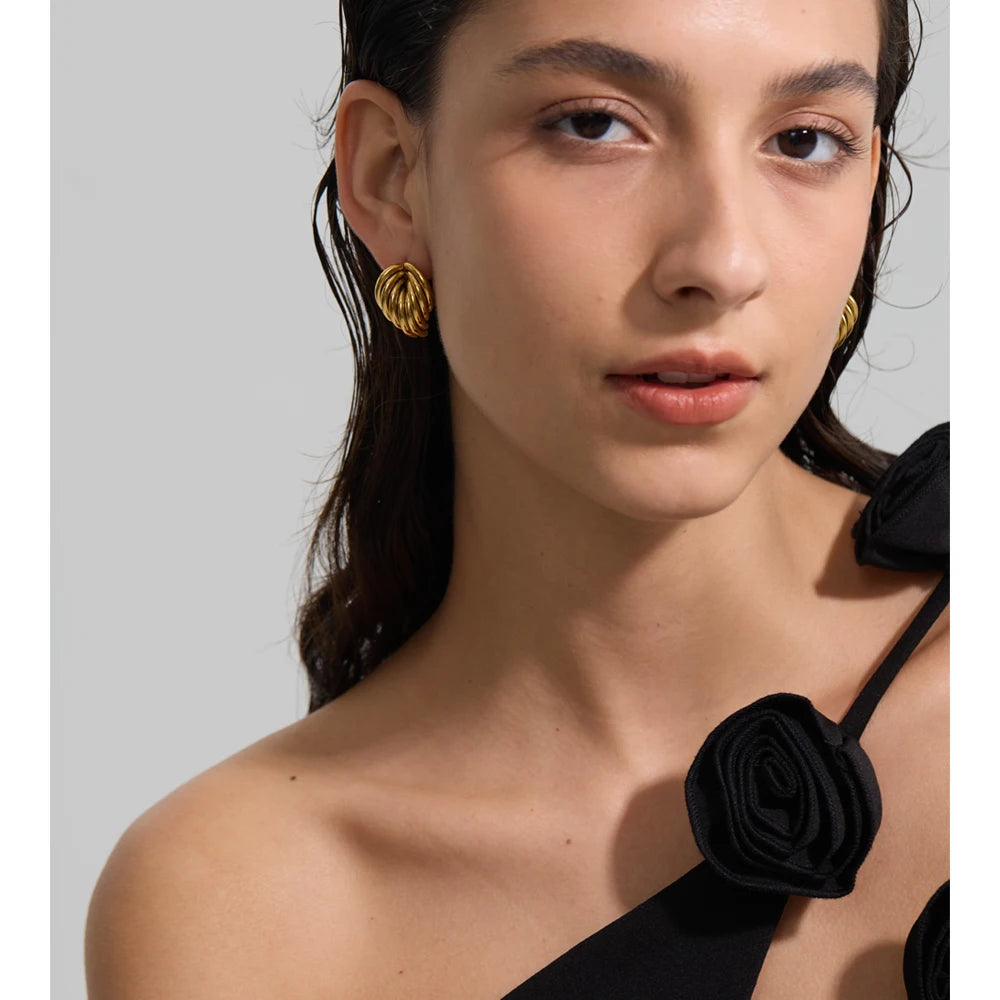 Geometric earrings in gold-plated stainless steel.