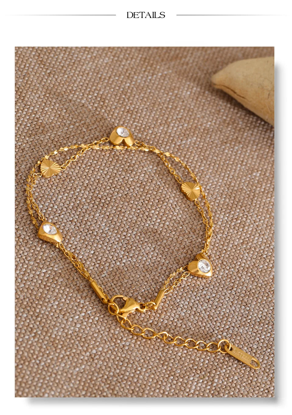 Cubic zirconia heart chain necklace in gold-plated stainless steel with cubic zirconia.