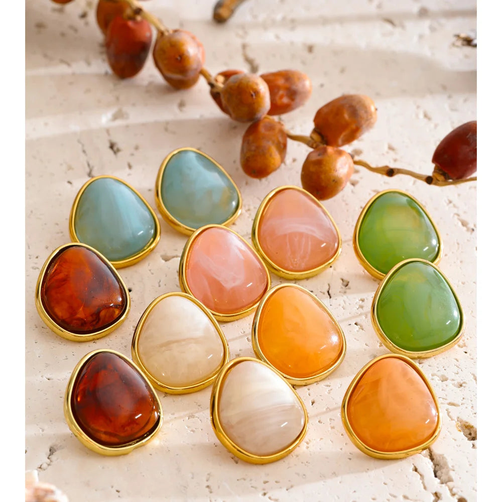 Resin acrylic multi-color earrings in gold-plated stainless steel with resin and acrylic.