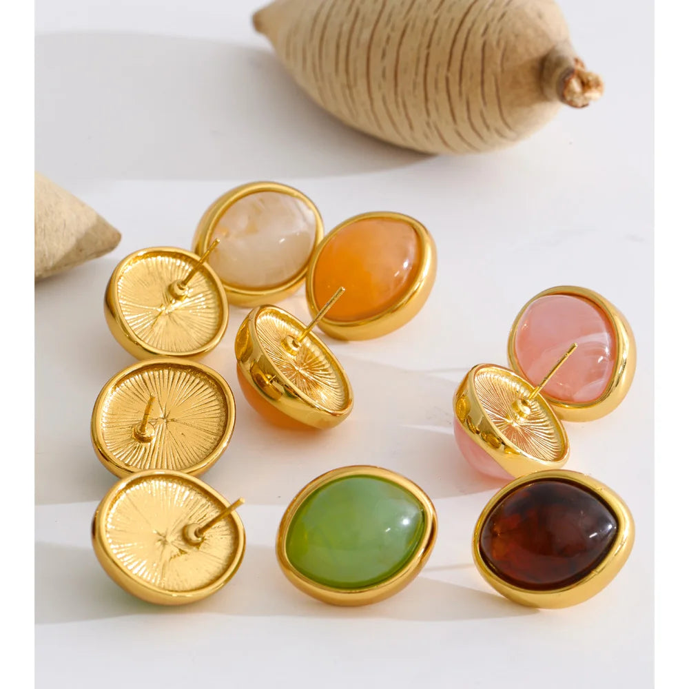 Resin multi-color geometric earrings in gold-plated stainless steel with resin.
