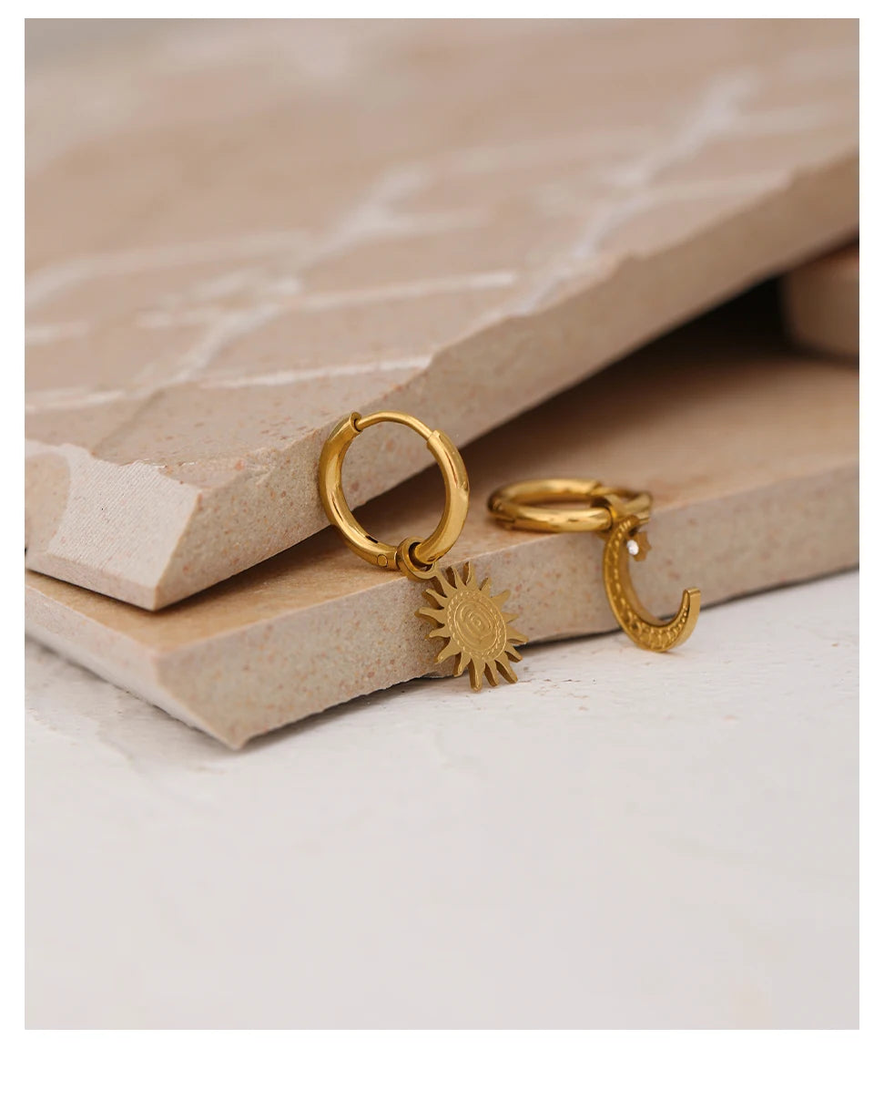 Star moon hammered earrings in gold-plated stainless steel.