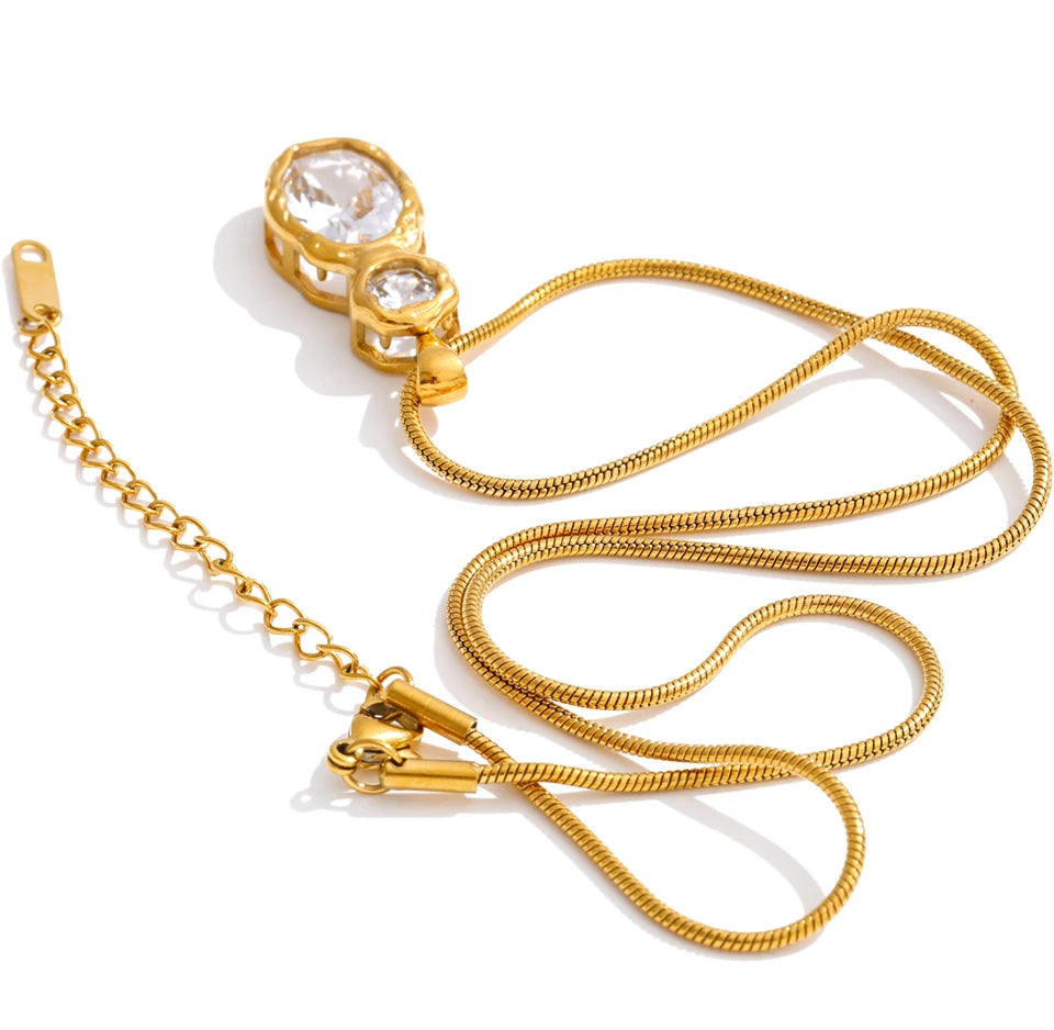 Cubic zirconia geometric necklace in gold-plated stainless steel with cubic zirconia.