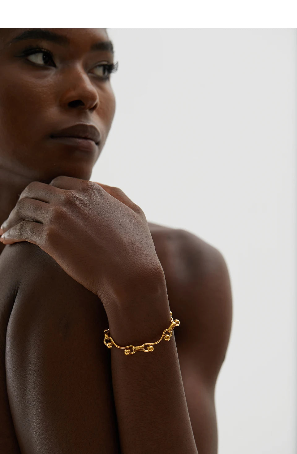 Geometric chain necklace in 18K gold-plated stainless steel.