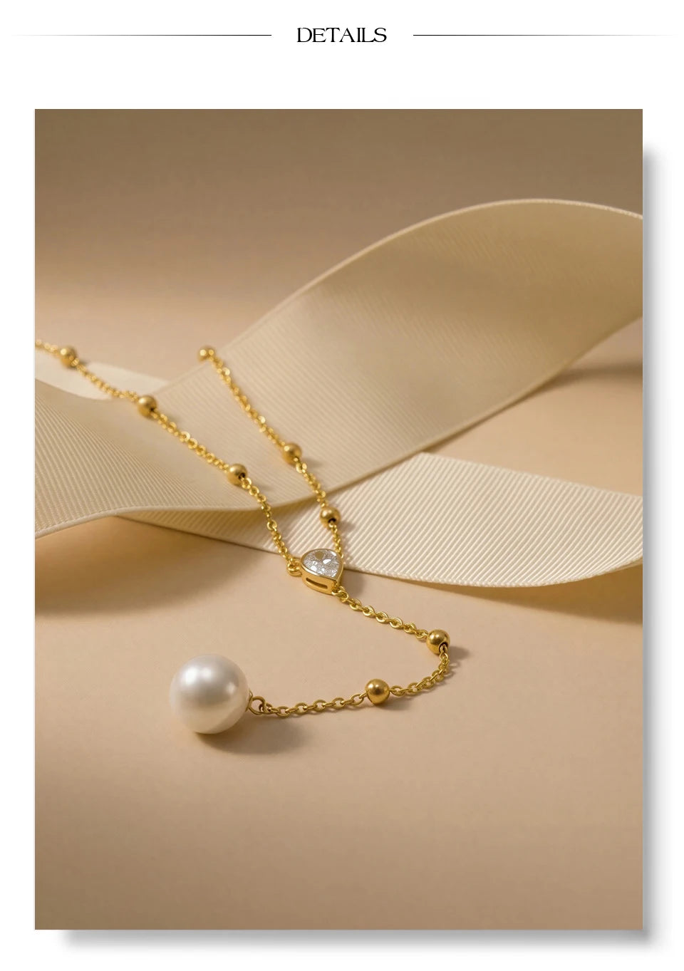 Cubic zirconia pearl geometric necklace in gold-plated stainless steel with pearl and cubic zirconia.