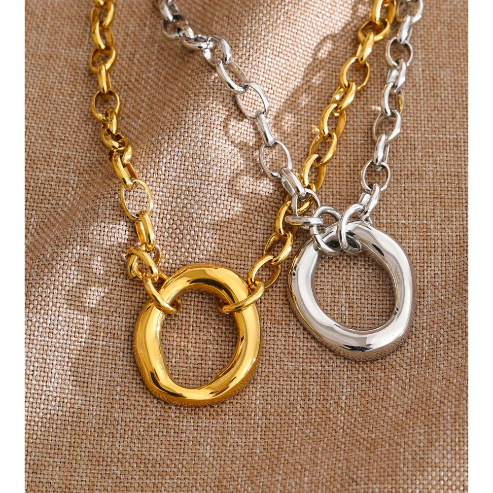 Coin geometric necklace in gold-plated stainless steel.