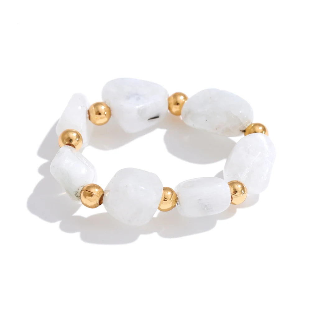 Natural stone geometric ring in 18K gold-plated stainless steel with natural stone.
