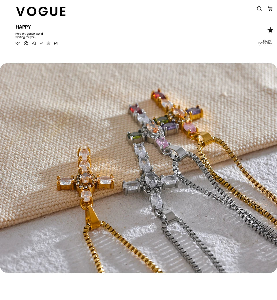 Cubic zirconia cross multi-color necklace in gold-plated stainless steel with cubic zirconia.