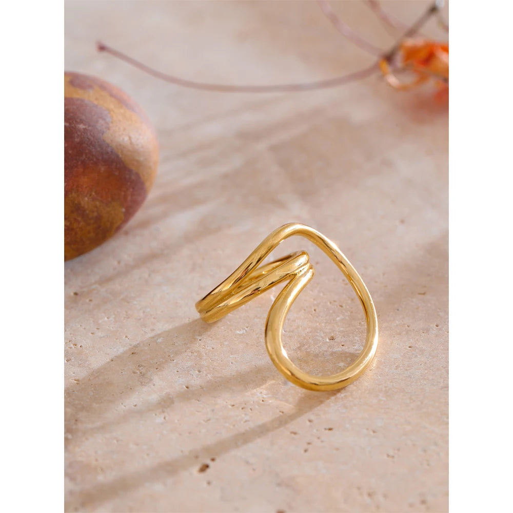 Geometric ring in 18K gold-plated stainless steel.