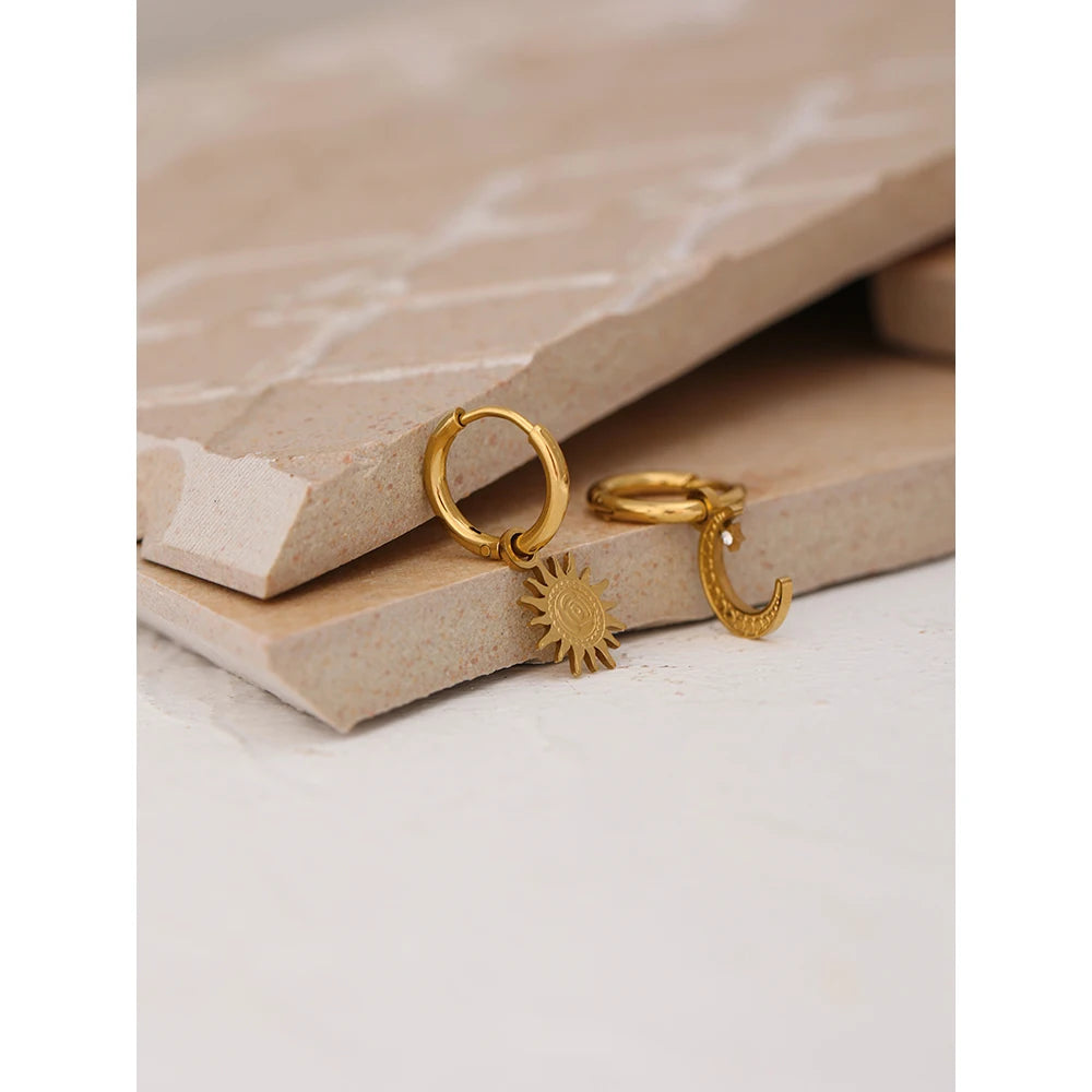 Star moon hammered earrings in gold-plated stainless steel.