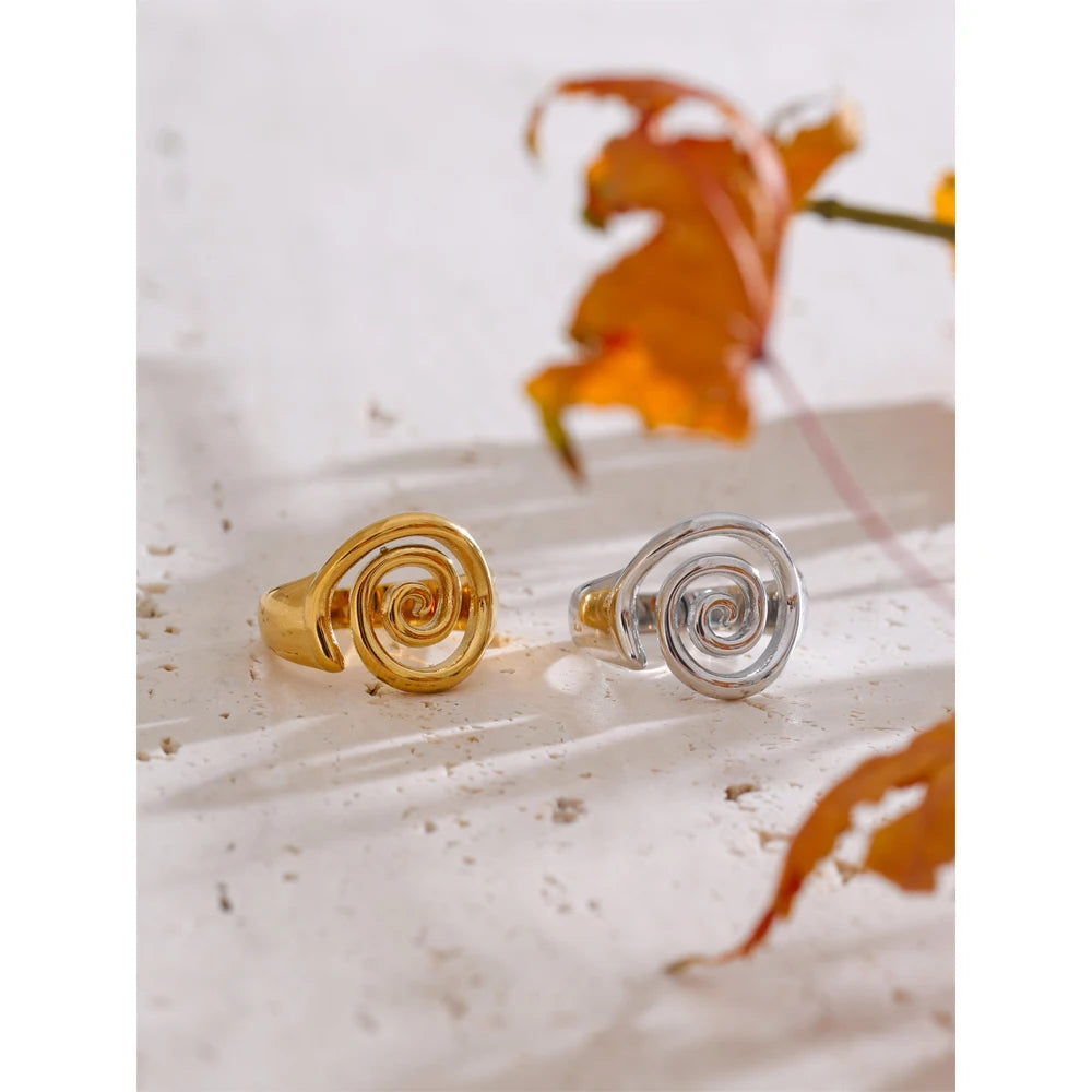 Geometric ring in gold-plated stainless steel.
