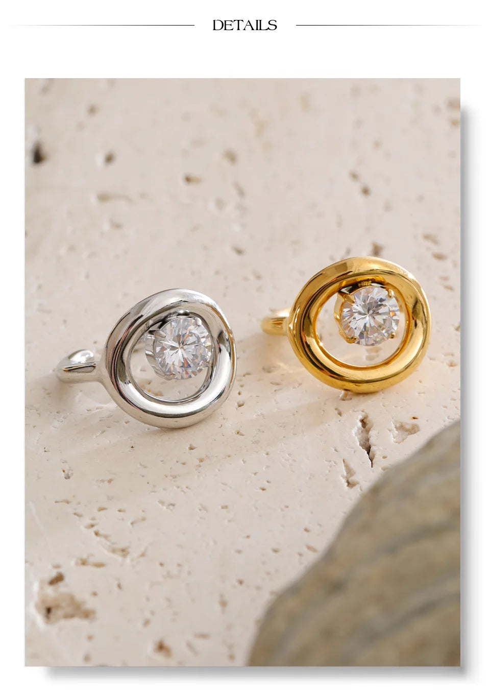 Cubic zirconia geometric ring in 18K gold-plated stainless steel with cubic zirconia.