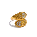 Cubic zirconia heart snake ring in gold-plated stainless steel with cubic zirconia.