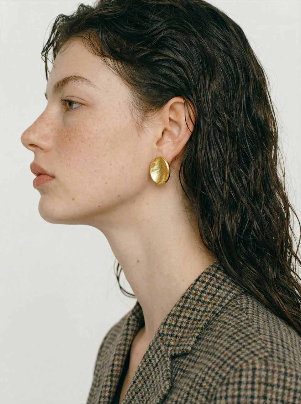 Geometric earrings in gold-plated stainless steel.