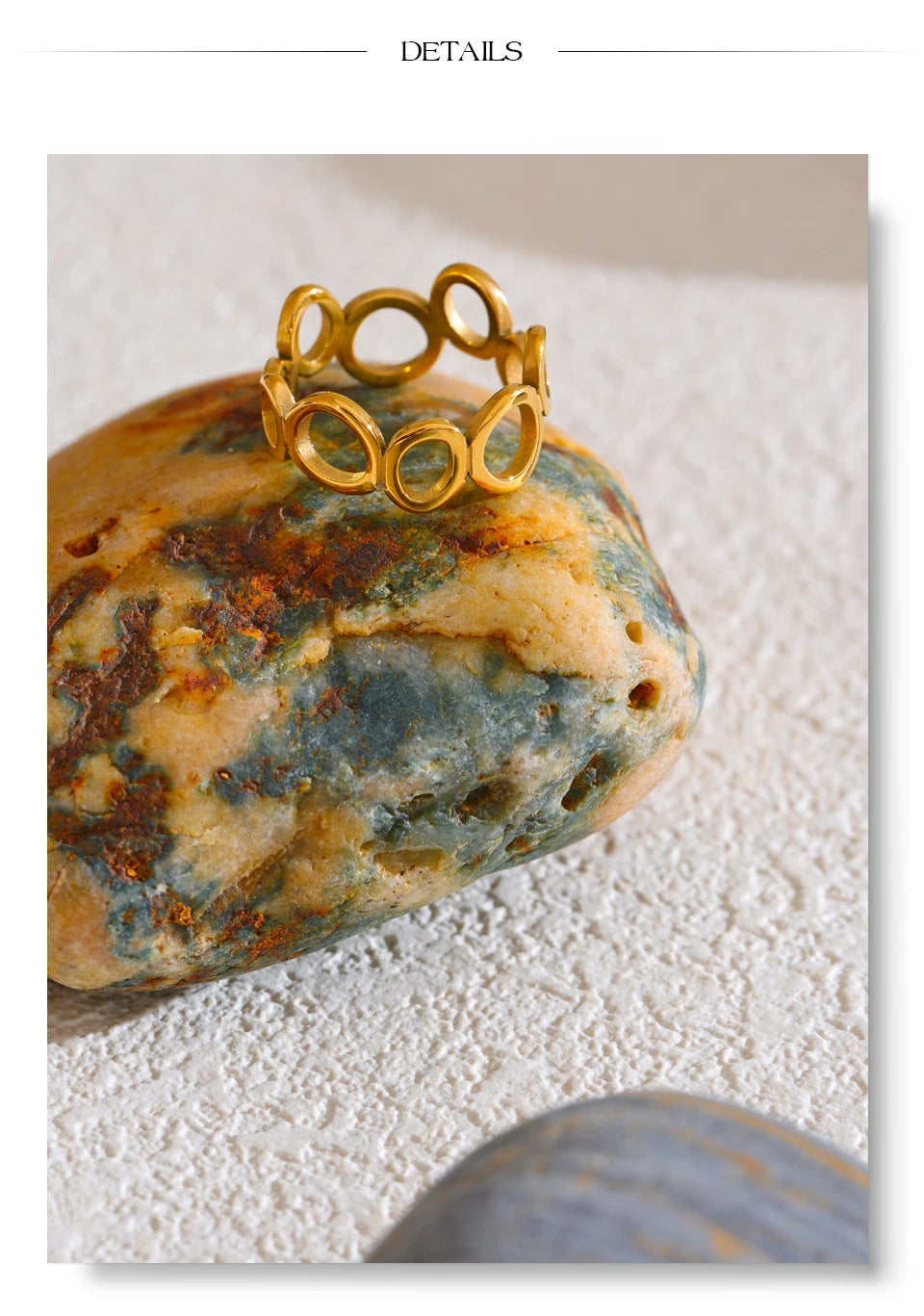 Geometric ring in 18K gold-plated stainless steel.