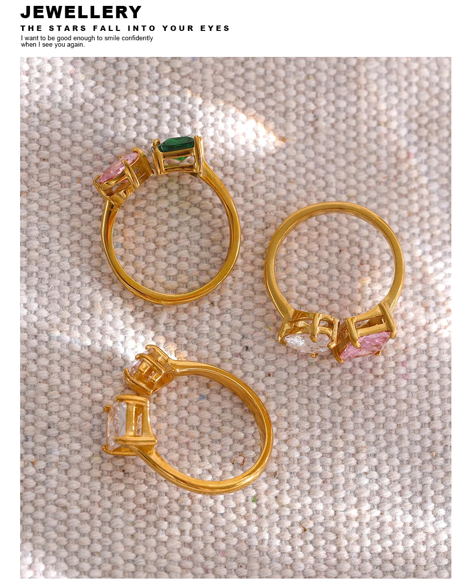 White cubic zirconia geometric ring in 18K gold-plated stainless steel with cubic zirconia.