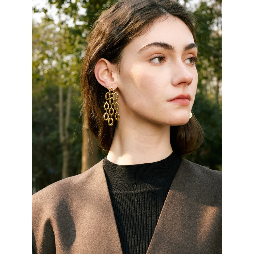 Geometric earrings in gold-plated stainless steel.
