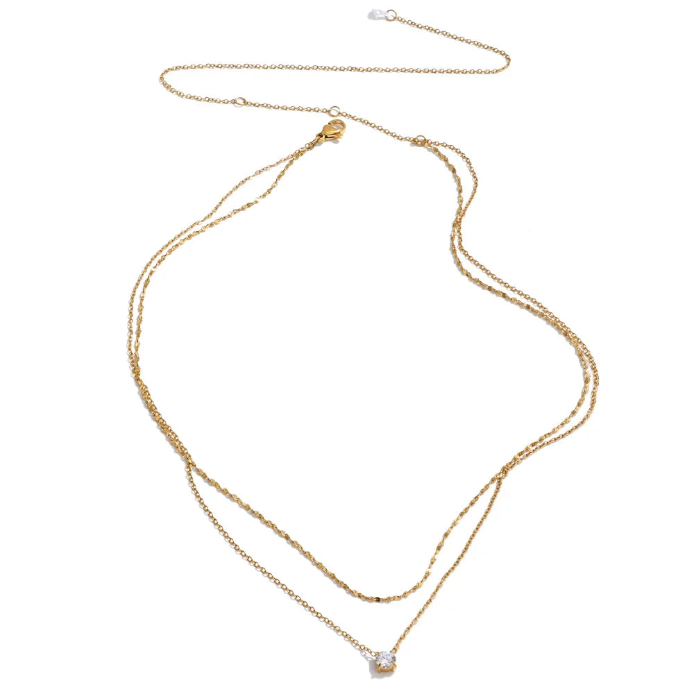 Cubic zirconia geometric chain necklace in gold-plated stainless steel with cubic zirconia.