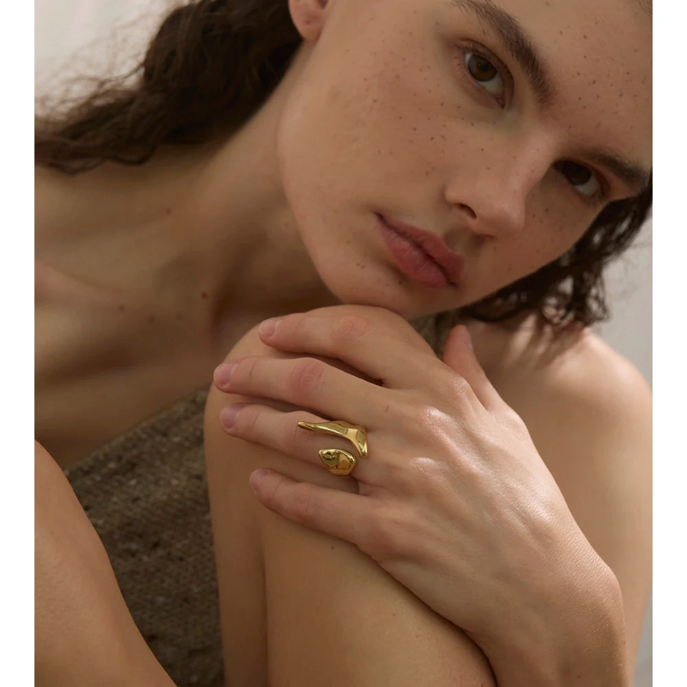 Geometric ring in 18K gold-plated stainless steel.