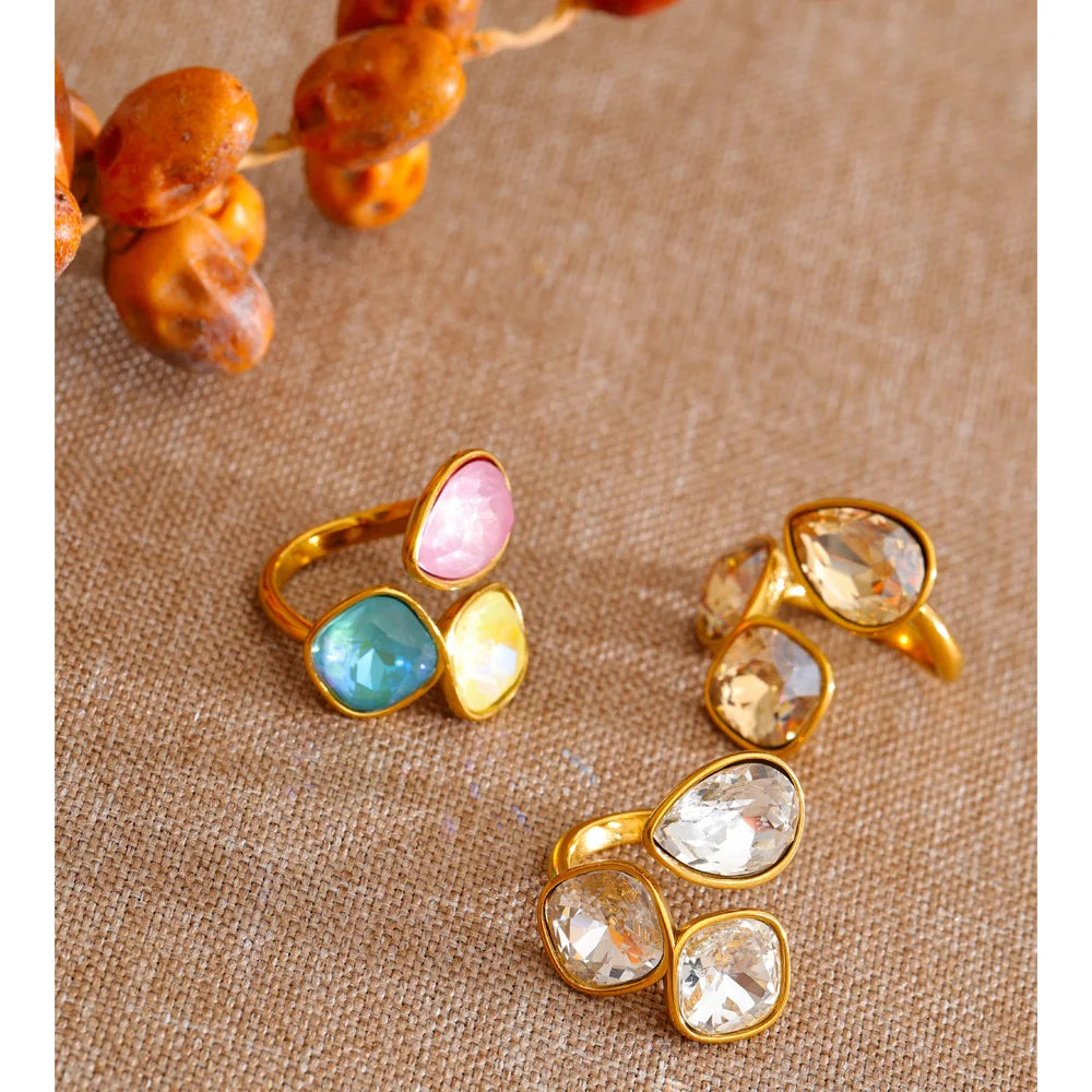 Crystal multi-color geometric ring in 18K gold-plated stainless steel with crystal.