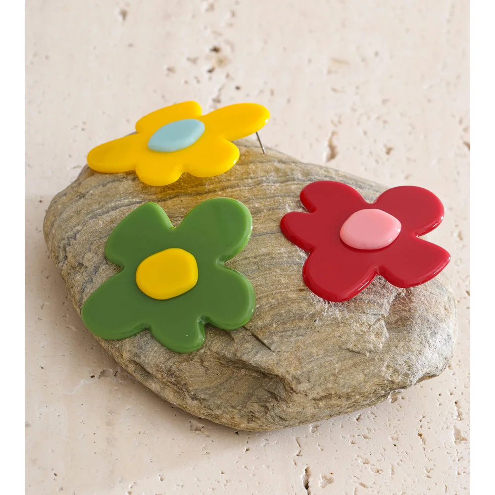 Green resin acrylic earrings in gold-plated stainless steel with resin and acrylic.