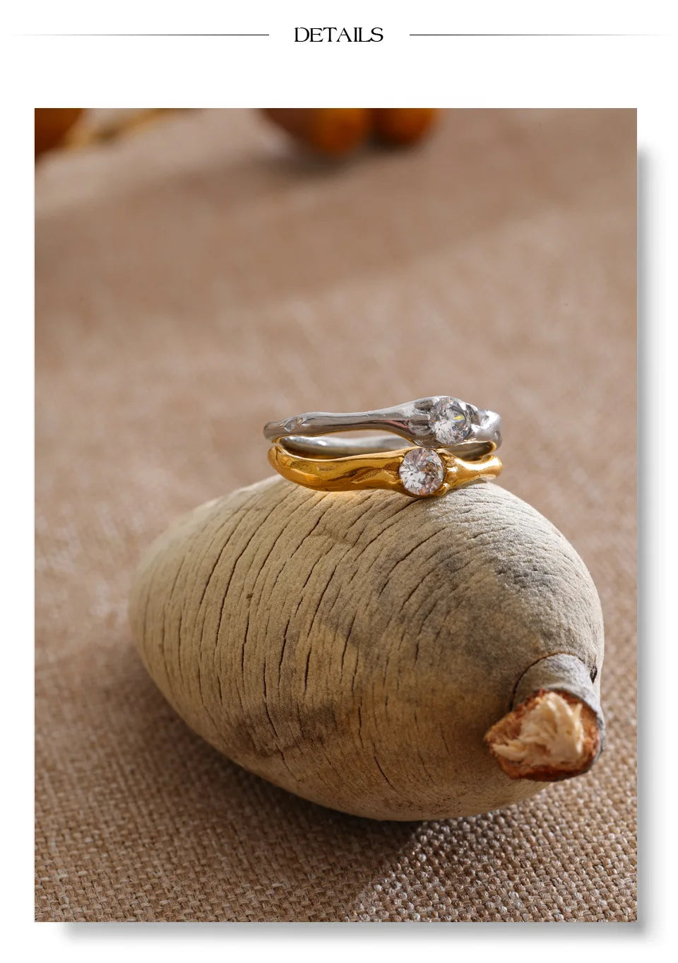 Cubic zirconia geometric ring in 18K gold-plated stainless steel with cubic zirconia.